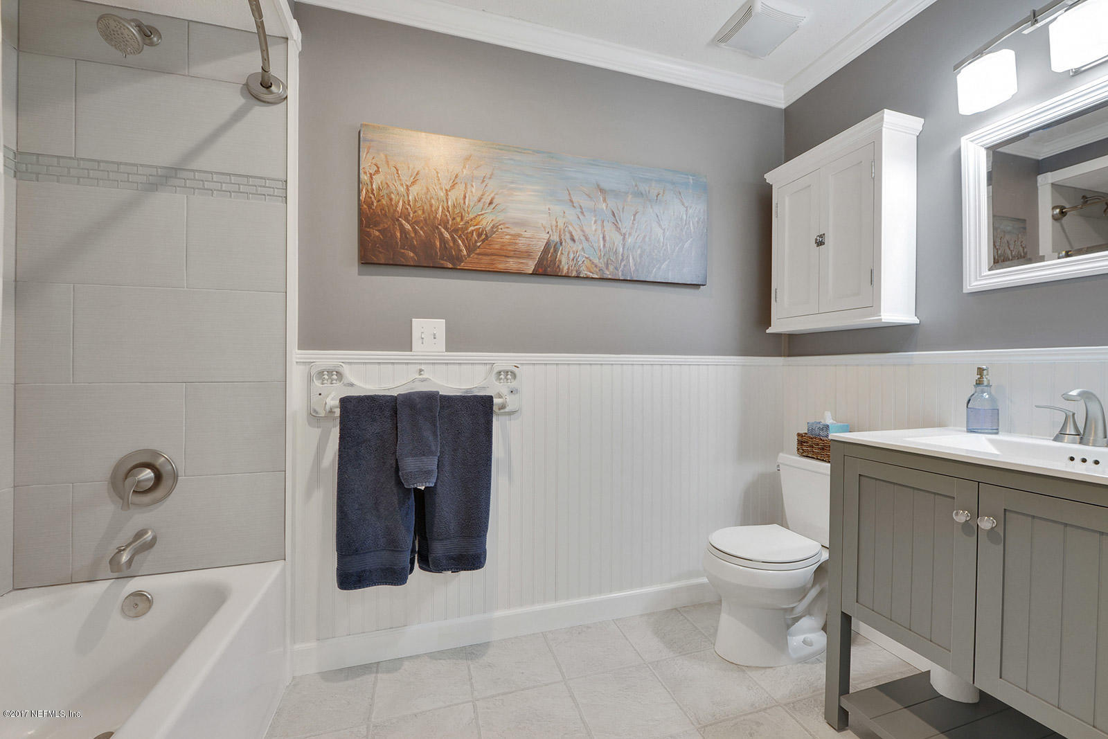 5280 Truman Pacetti Road St. Augustine, FL 32092 - Photo 23 of 34 a bathroom with a toilet sink and mirror