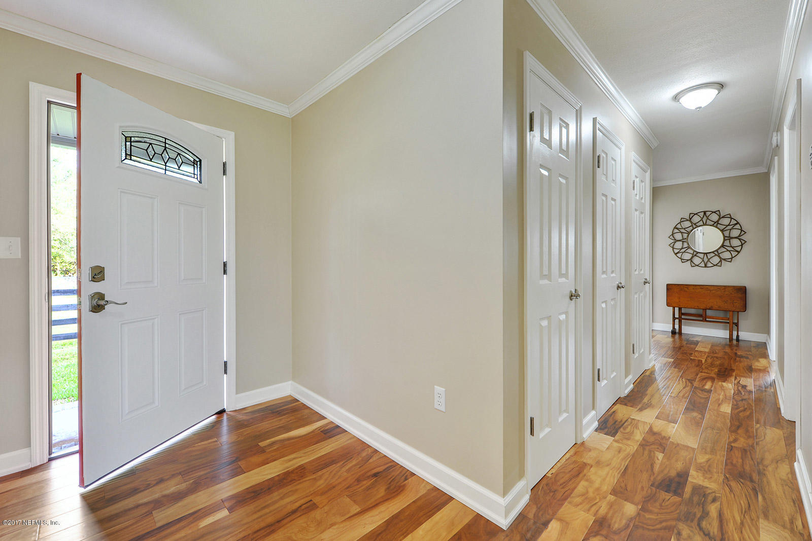 5280 Truman Pacetti Road St. Augustine, FL 32092 - Photo 24 of 34 a view of hallway with wooden floor