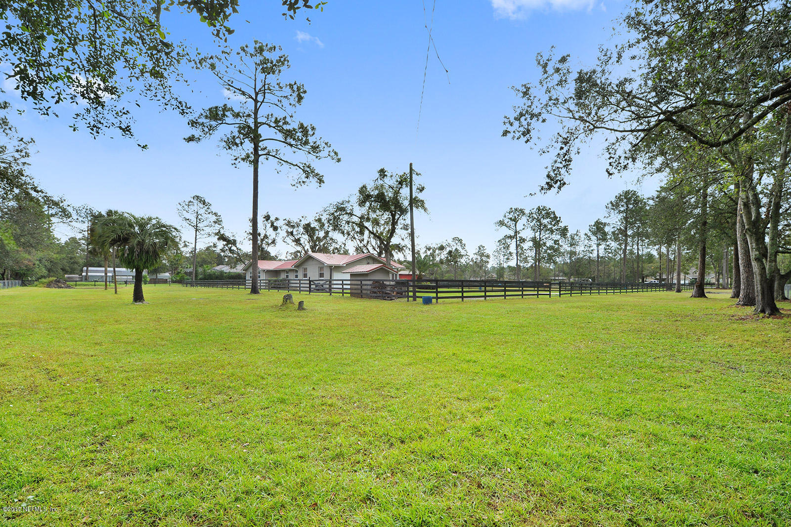 5280 Truman Pacetti Road St. Augustine, FL 32092 - Photo 30 of 34 a view of a golf course with a lake view