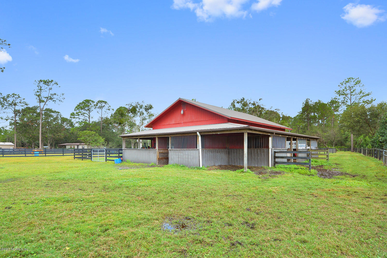 5280 Truman Pacetti Road St. Augustine, FL 32092 - Photo 32 of 34 a view of a house with a yard