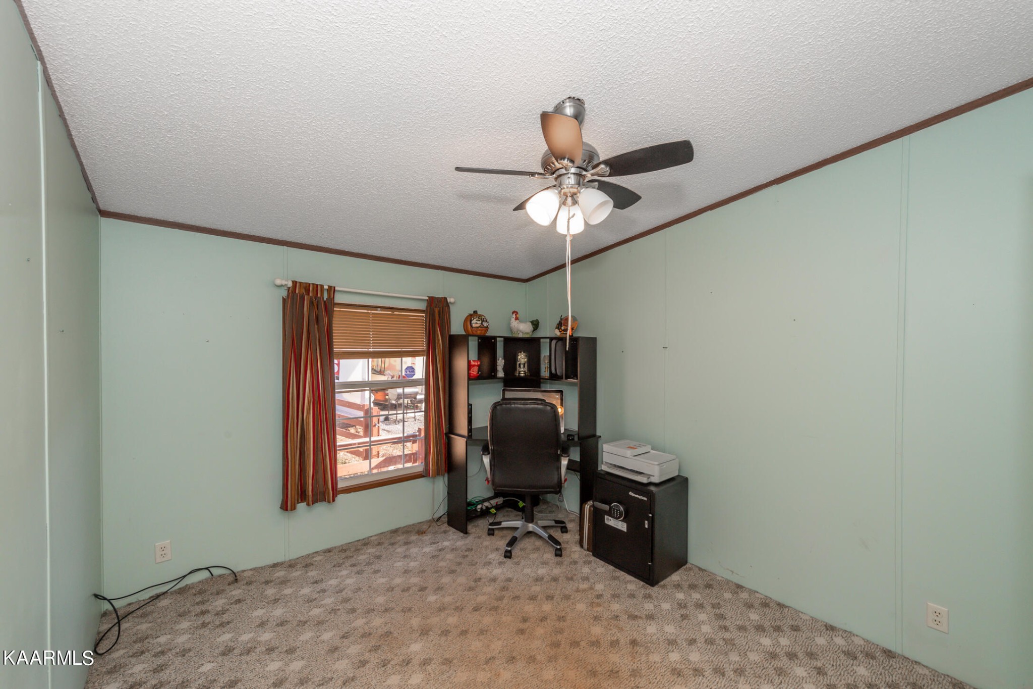 2382 River Road Kingston, TN 37763 - Photo 34 of 60 a view of a workspace with furniture and a window