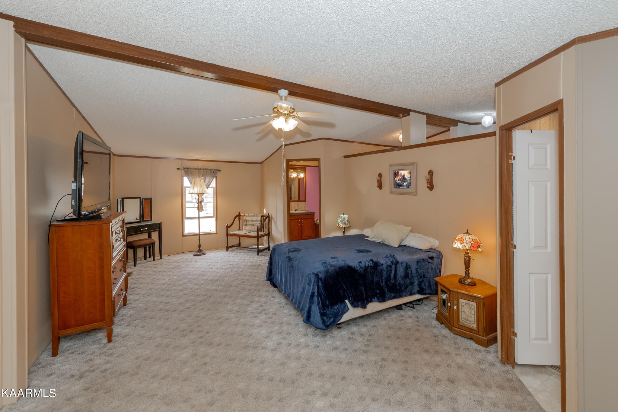 2382 River Road Kingston, TN 37763 - Photo 43 of 60 a spacious bedroom with a bed and wooden floor