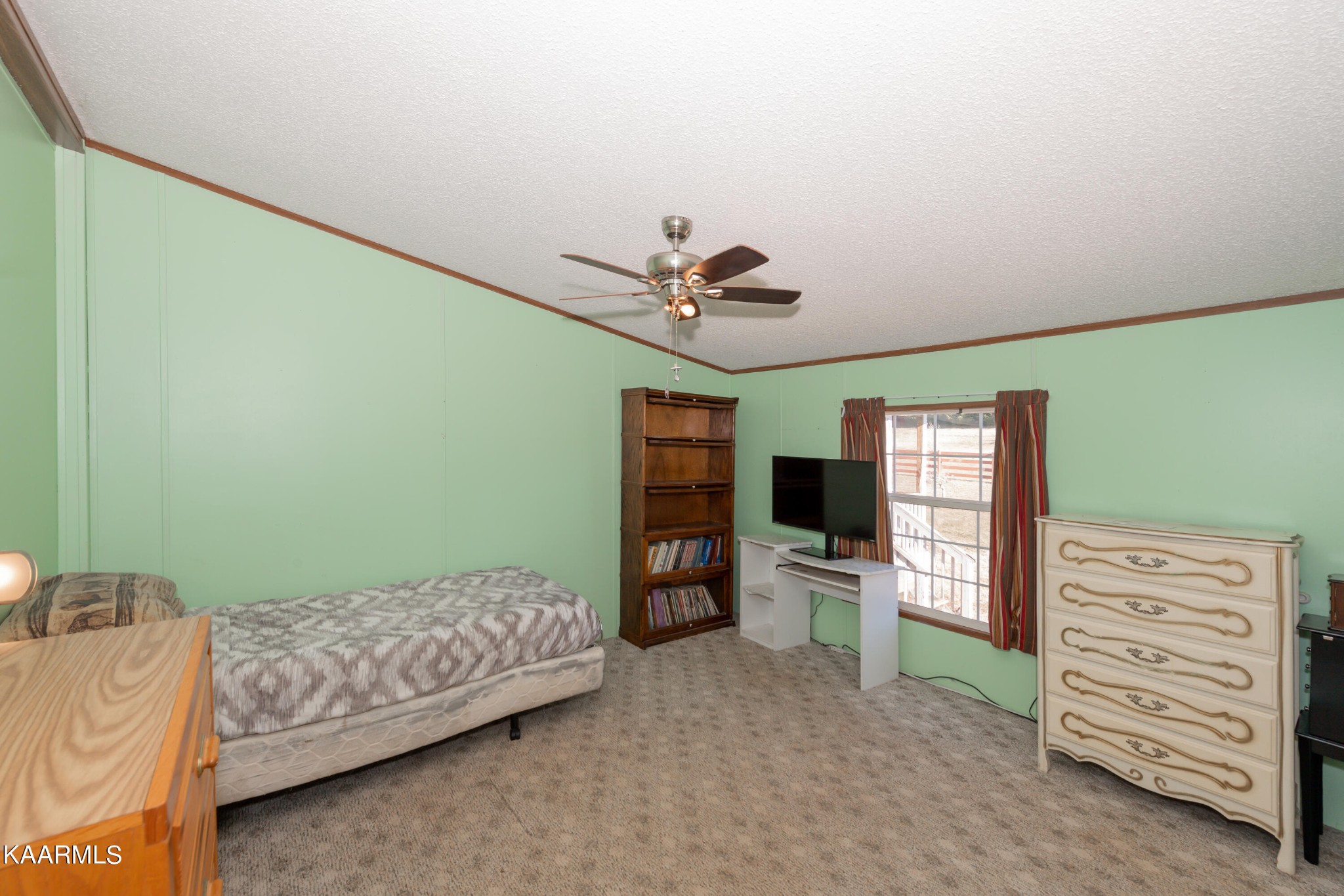 2382 River Road Kingston, TN 37763 - Photo 60 of 60 a bedroom with a bed and furniture