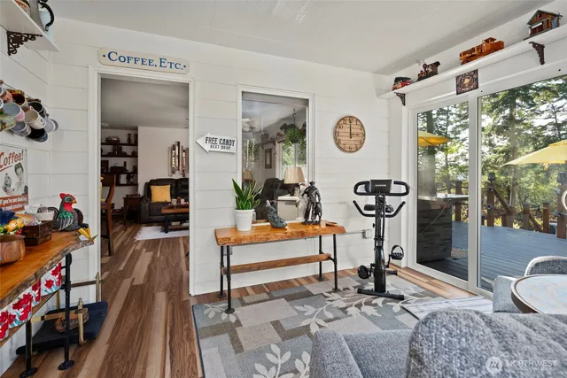 a spacious bedroom with a bed and a large window