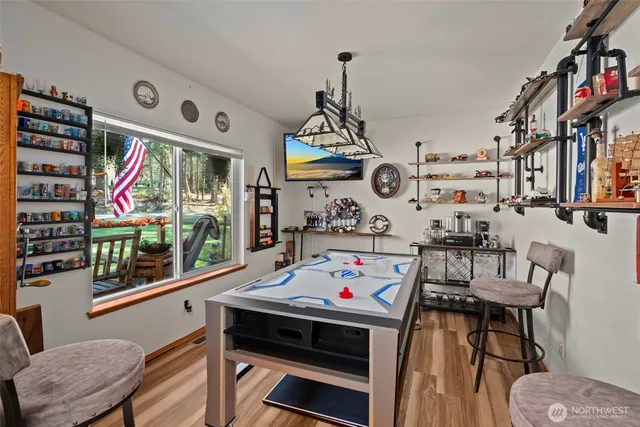 a bathroom with a bathtub and a window
