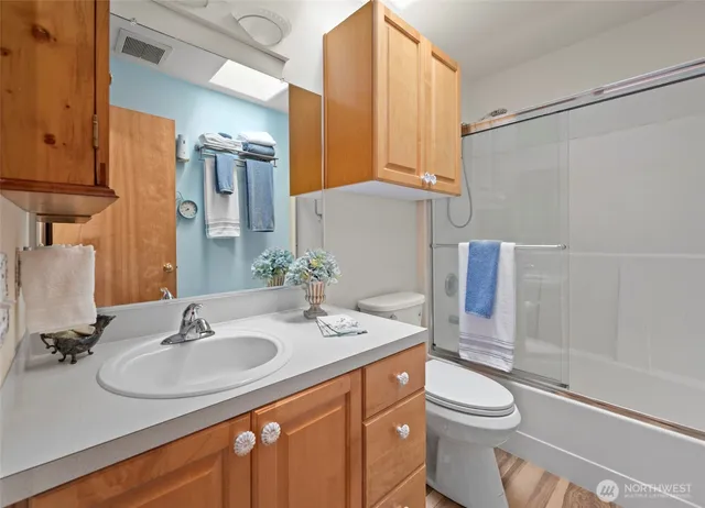 an outdoor space with furniture and umbrella