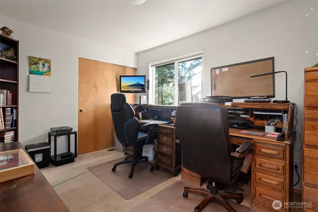 a view of a backyard with sitting area