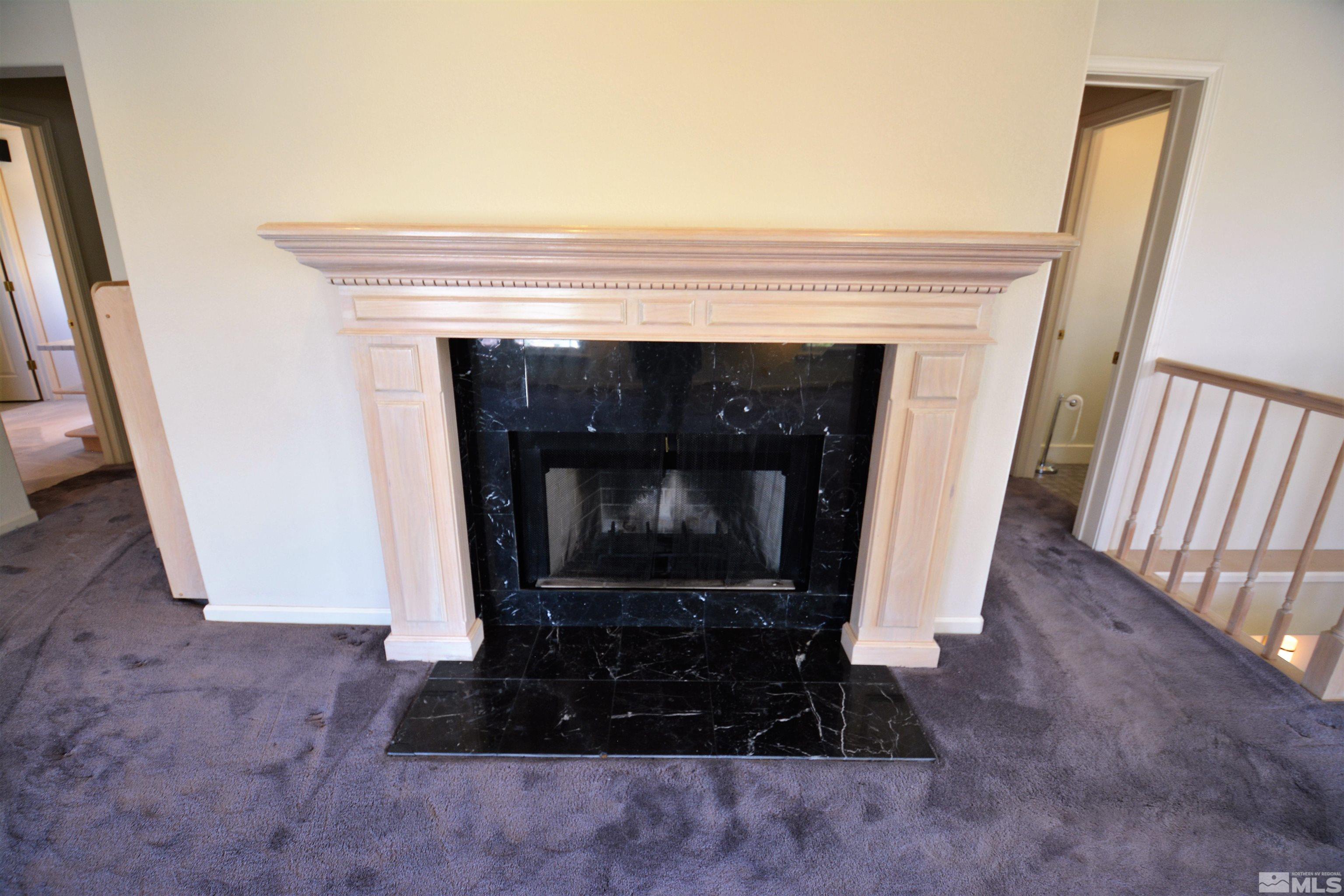 545 Skyline Boulevard Reno, NV 89509 - Photo 20 of 39 a living room with a fireplace