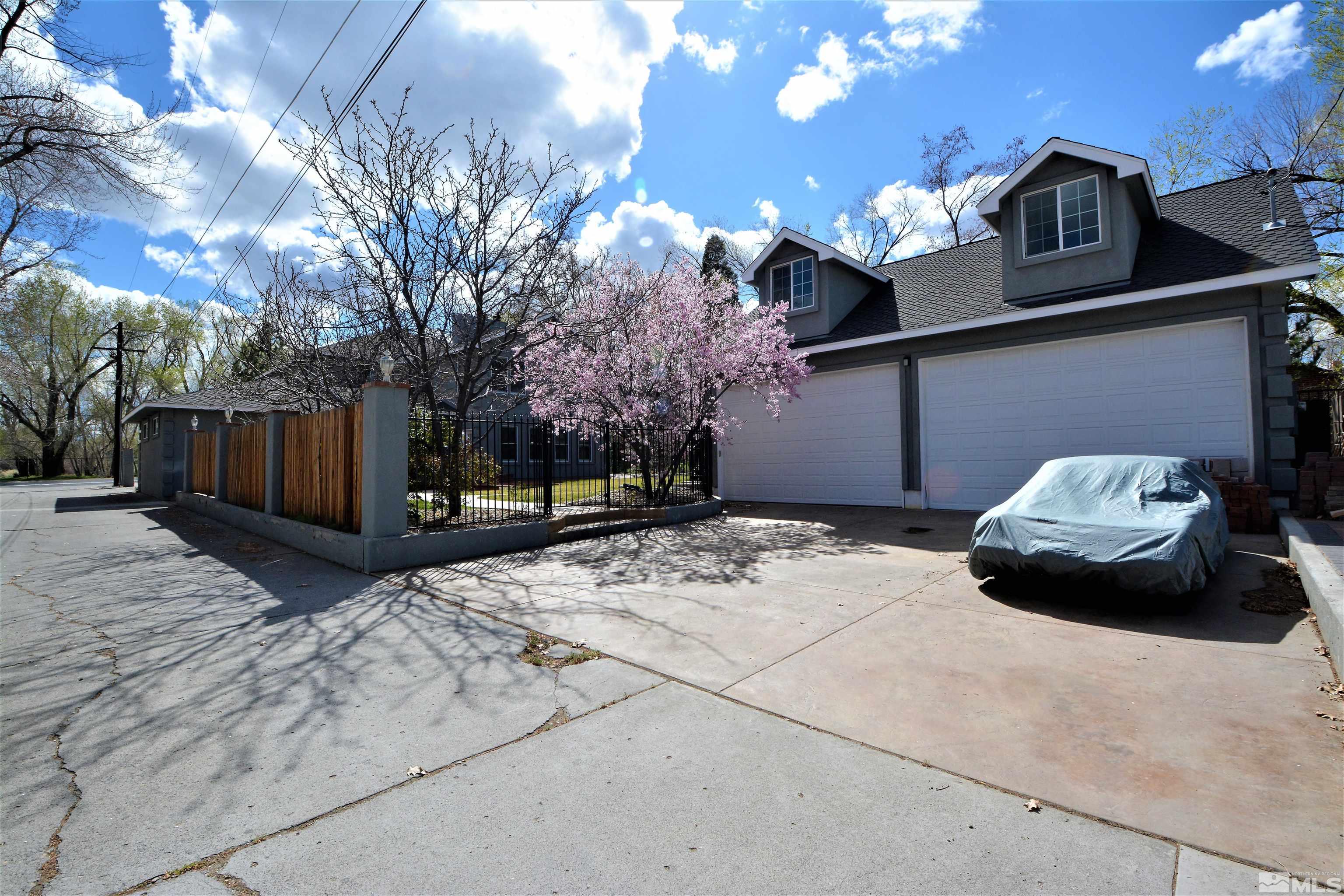 545 Skyline Boulevard Reno, NV 89509 - Photo 3 of 39 a car parked in front of a house