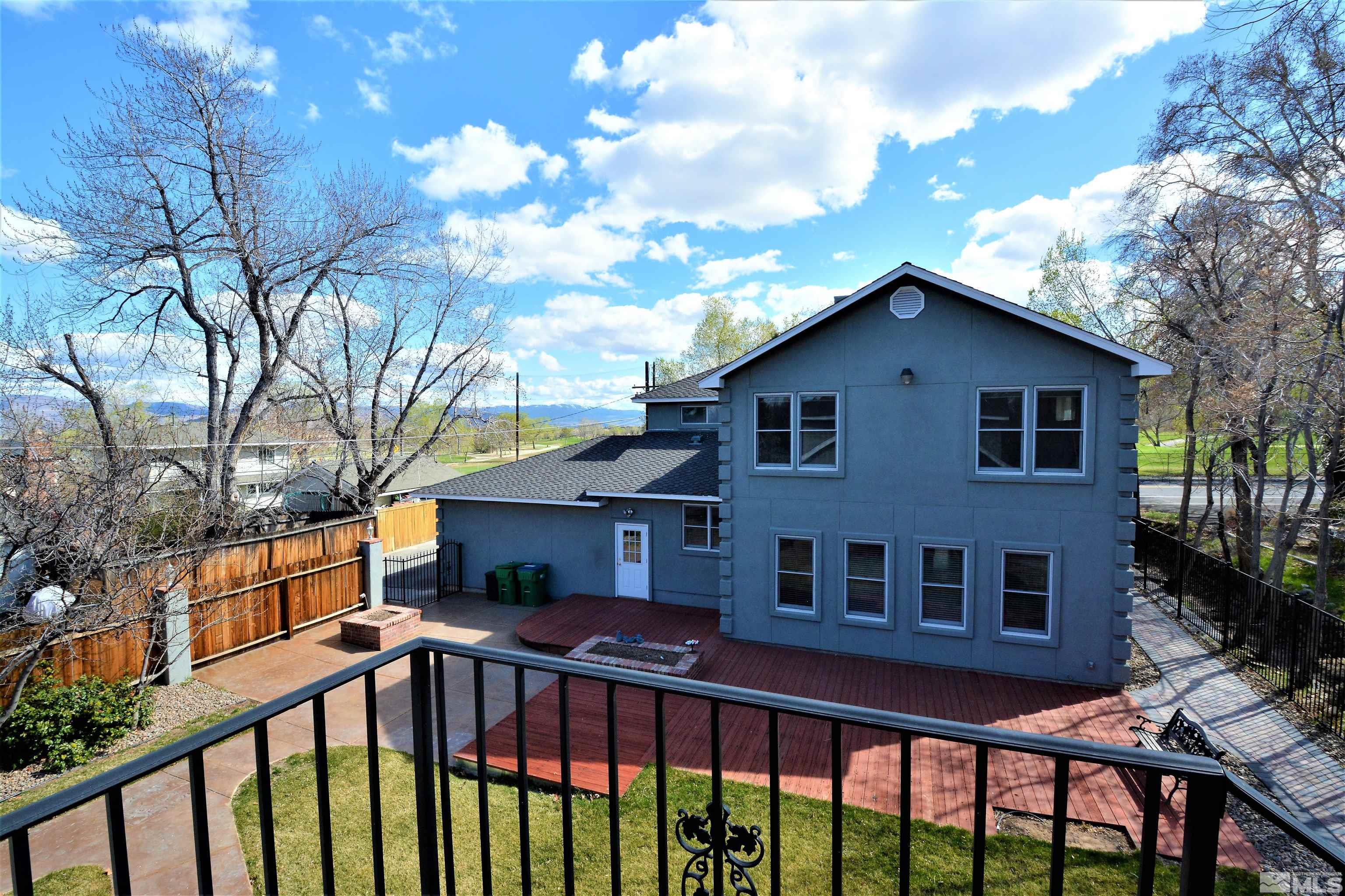 545 Skyline Boulevard Reno, NV 89509 - Photo 35 of 39 a view of a brick house with a large windows
