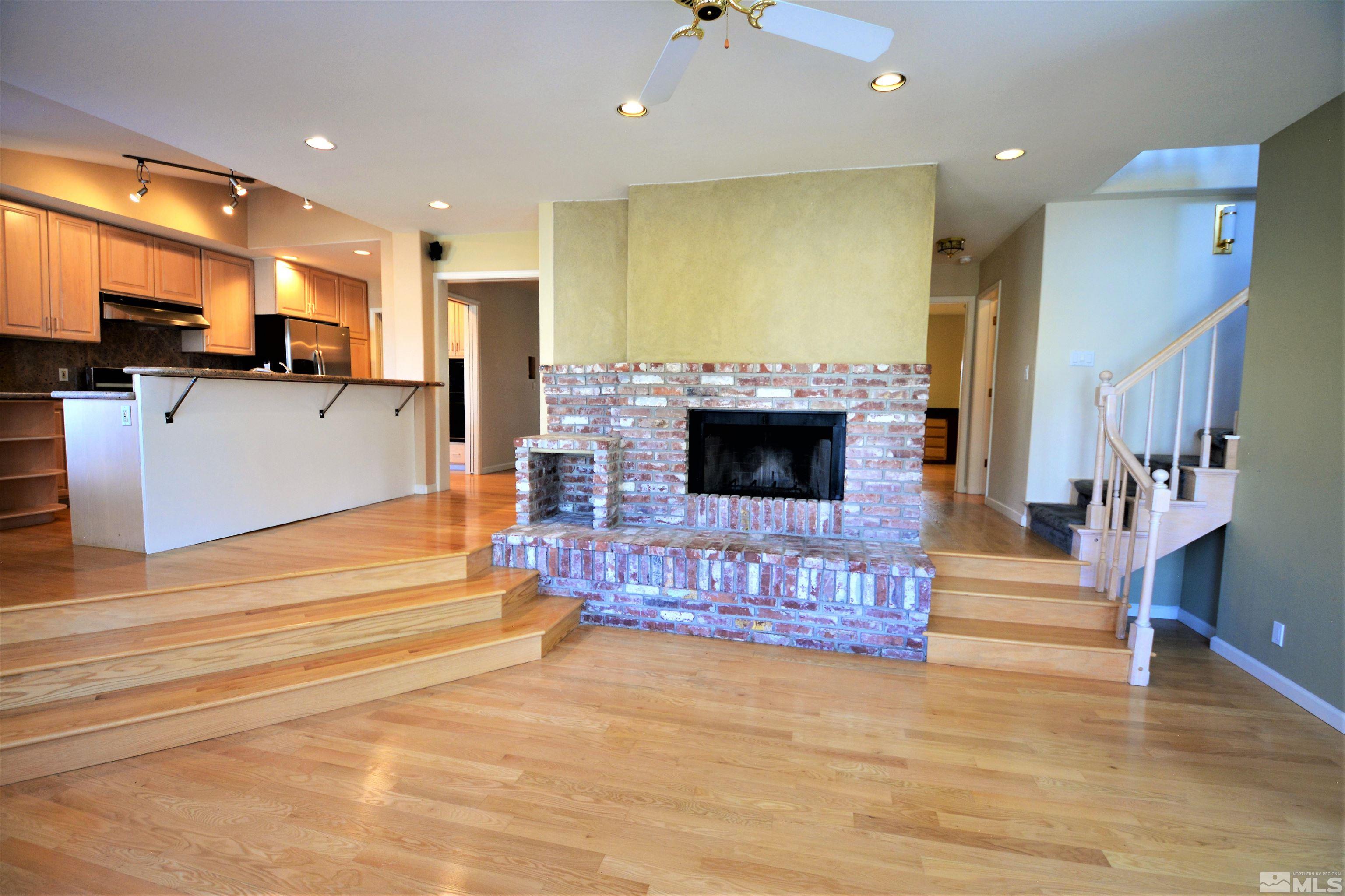 545 Skyline Boulevard Reno, NV 89509 - Photo 10 of 39 a living room with furniture and a flat screen tv