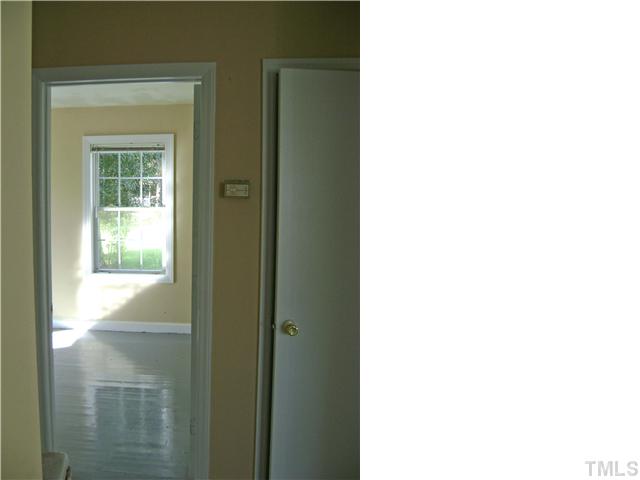 1408 Curfman Street Raleigh, NC 27603 - Photo 3 of 4 The bedrooms are just through the hall each hosting spacious closets!