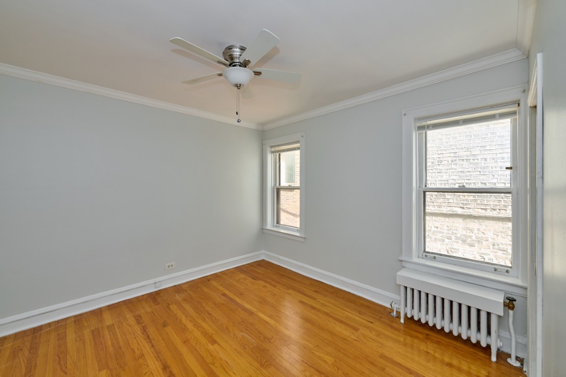 1112 Grove Street, Unit 2B Evanston, IL 60201 - Photo 15 of 21 a view of an empty room with a window