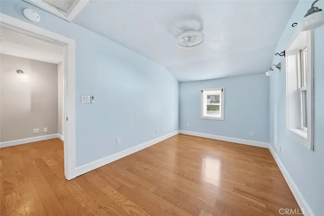 a bathroom with a sink toilet and a mirror