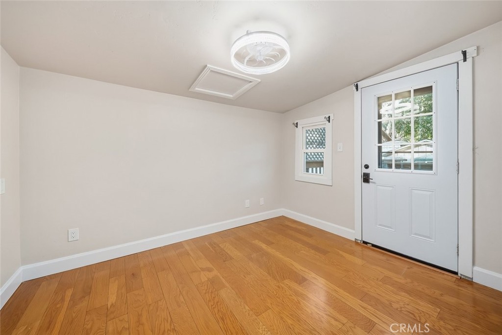 273 Pacific Avenue Paso Robles, CA 93446 - Photo 15 of 32 a view of a room with wooden floor and windows
