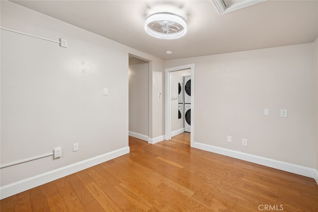 273 Pacific Avenue Paso Robles, CA 93446 - Photo 17 of 32 a view of an empty room with wooden floor