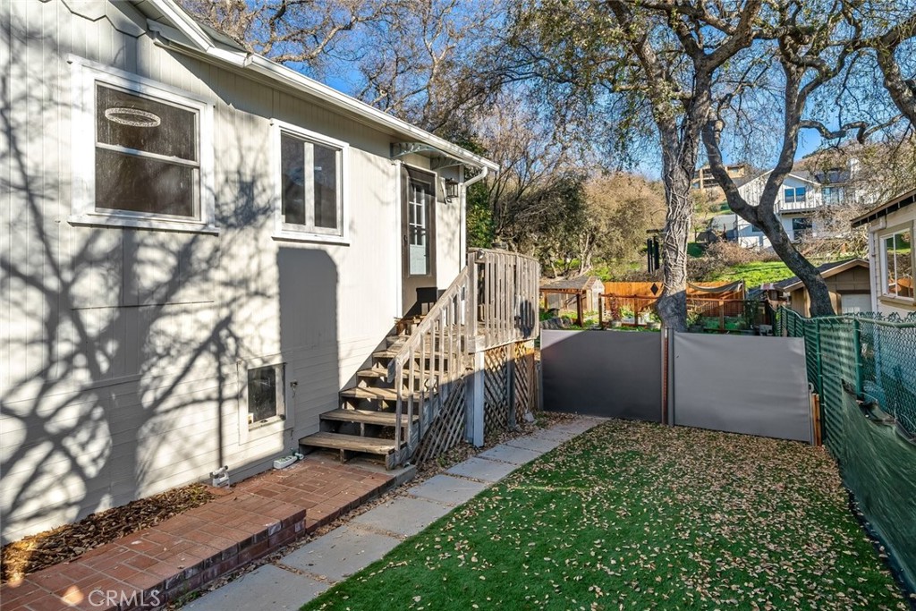 273 Pacific Avenue Paso Robles, CA 93446 - Photo 29 of 32 a view of a house with a yard and wooden fence