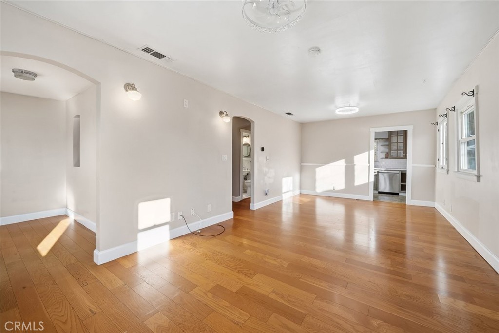 273 Pacific Avenue Paso Robles, CA 93446 - Photo 5 of 32 a view of empty room with wooden floor