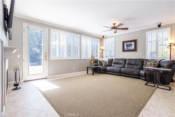 a living room with furniture and a window