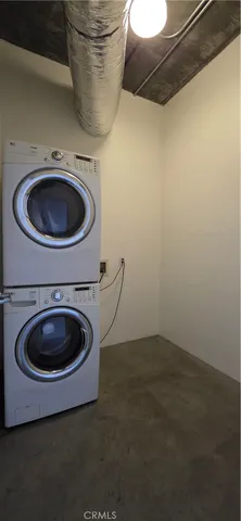 a living room with a couch and a stove