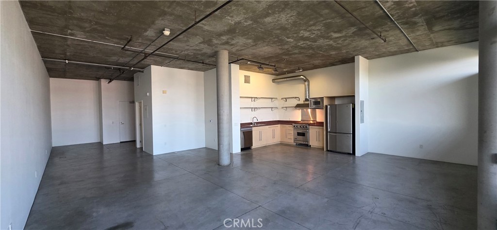 835 Locust Avenue, Unit 521 Long Beach, CA 90813 - Photo 4 of 18 a view of a storage & utility room with a sink