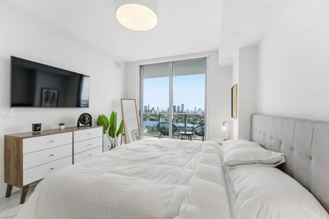 a bathroom with a double vanity sink and mirror