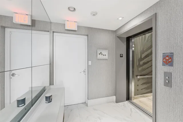 a view of a balcony with an ocean view