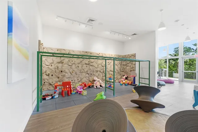 front view of a house with a swimming pool