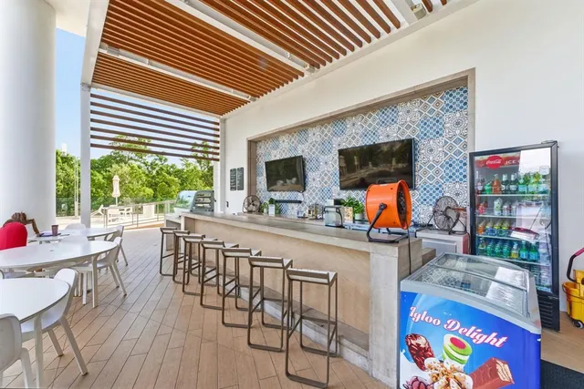 an aerial view of a house with outdoor space
