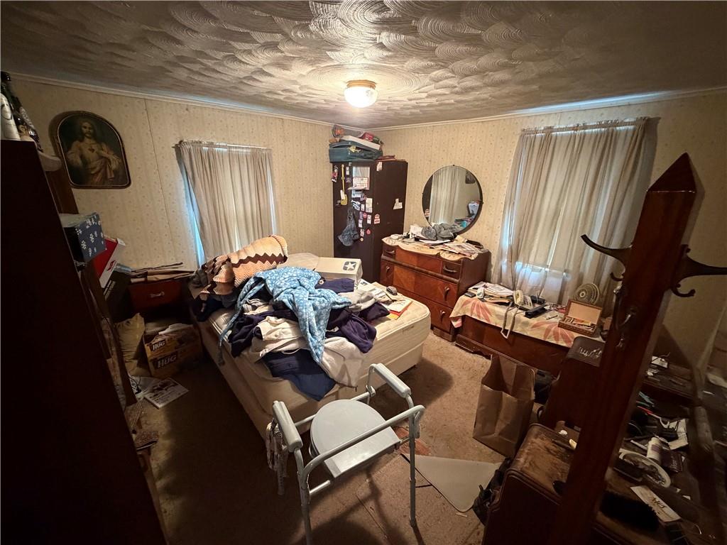 126 Hogsett Street Uniontown, PA 15401 - Photo 13 of 33 a view of a room that has a bed and toys