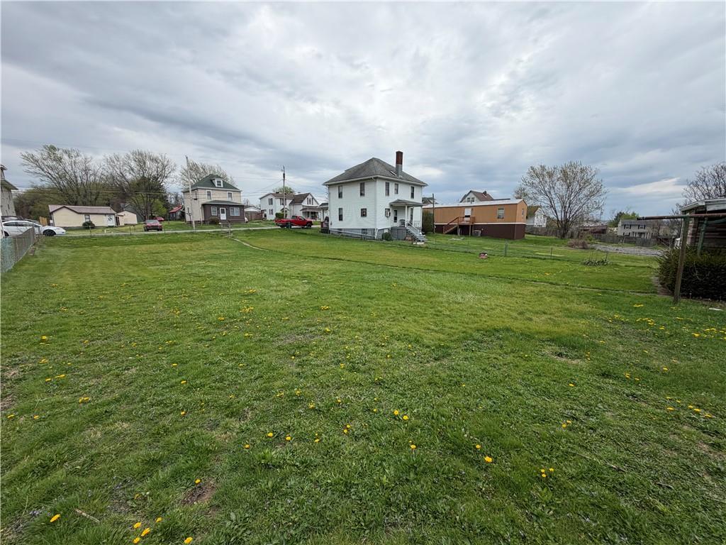 126 Hogsett Street Uniontown, PA 15401 - Photo 33 of 33 a view of house with garden and car parked