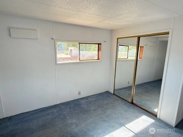a view of an empty room with window