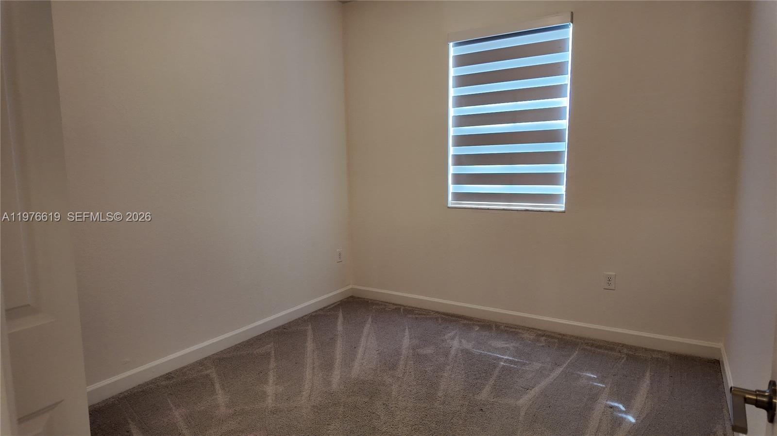 16243 Southwest 292nd Street, Unit 16243 Homestead, FL 33033 - Photo 27 of 30 a small space with a window