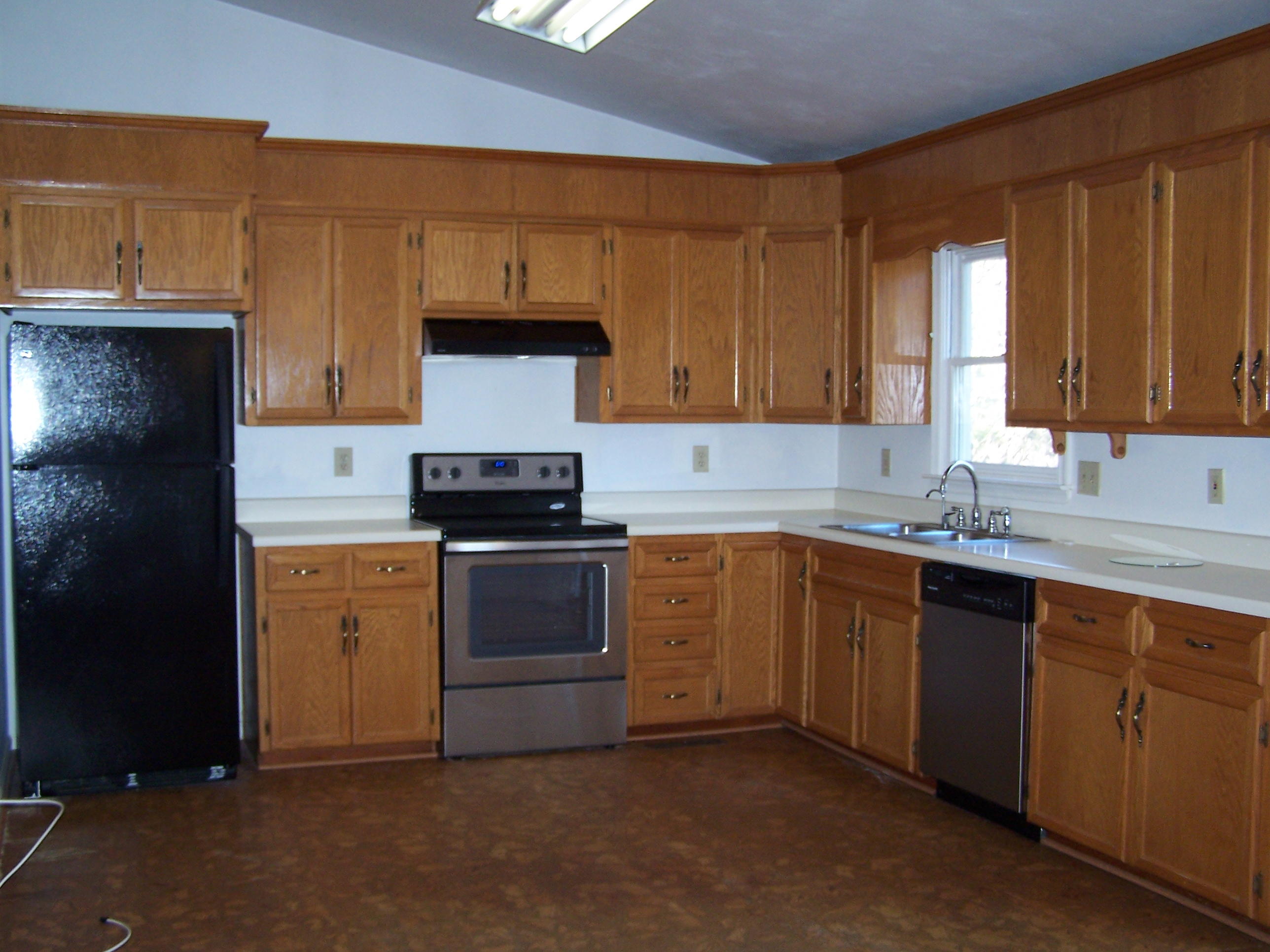 164 Fields Avenue Blue Ridge, VA 24064 - Photo 5 of 22 a kitchen with stainless steel appliances granite countertop a stove a sink and a refrigerator