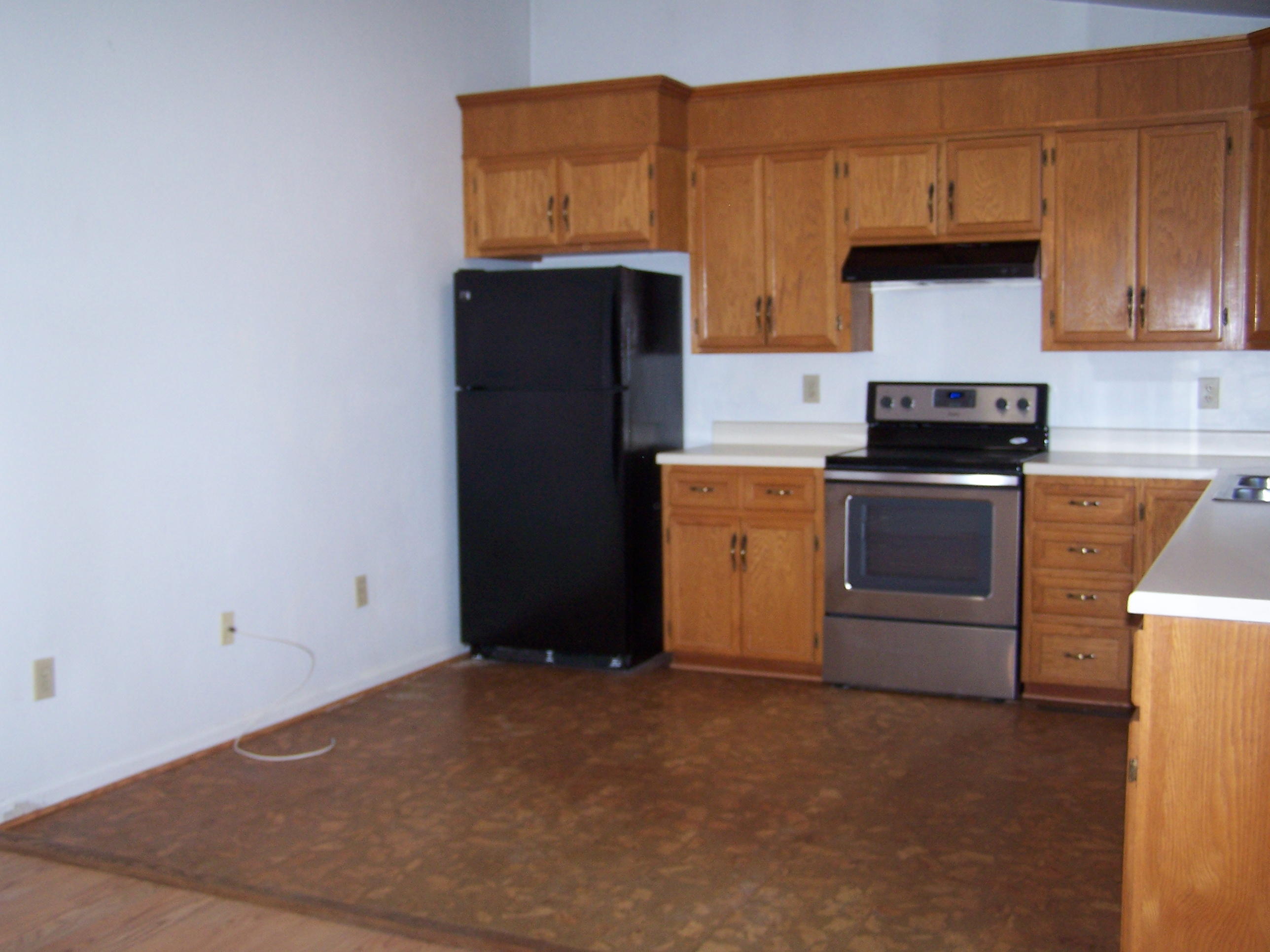 164 Fields Avenue Blue Ridge, VA 24064 - Photo 6 of 22 a kitchen with a stove and a refrigerator