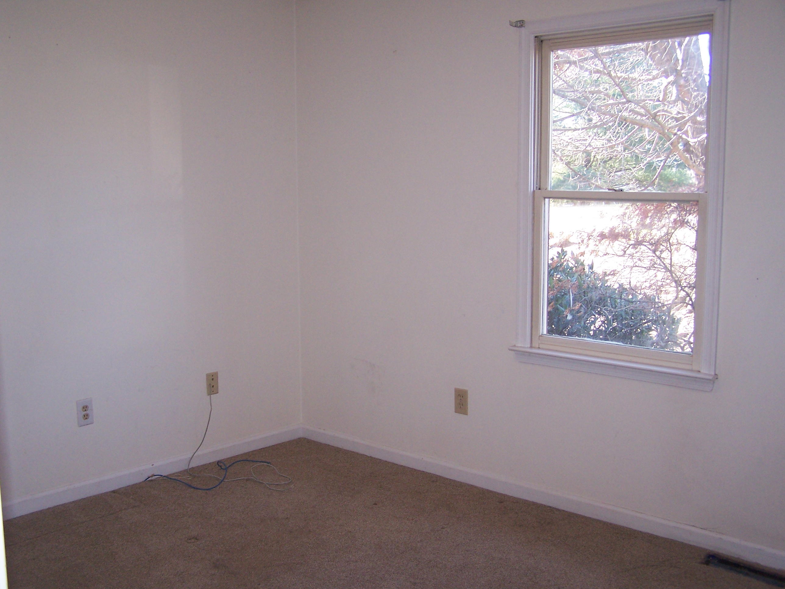 164 Fields Avenue Blue Ridge, VA 24064 - Photo 9 of 22 an empty room with a window