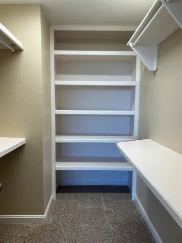 a storage room with washer and dryer