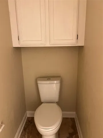 a bathroom with a toilet
