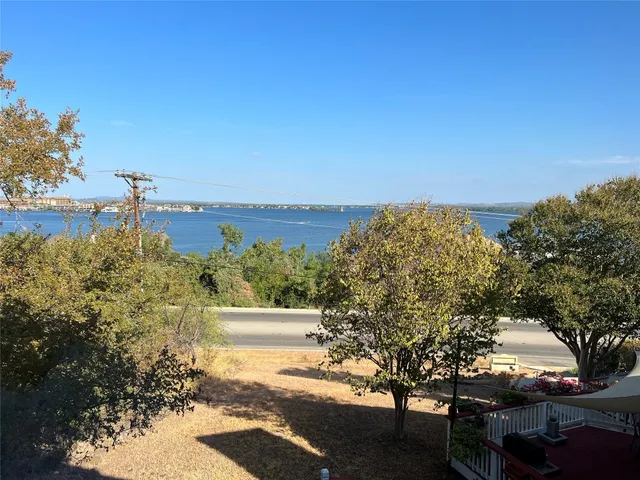 a view of a lake with a building in front of it