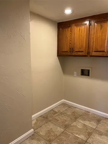 a view of a kitchen with wooden floor