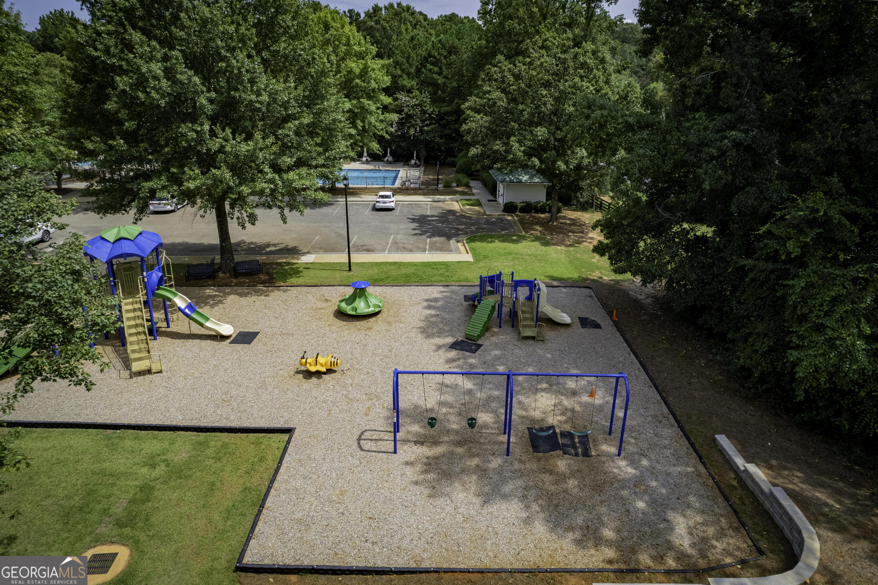 25 The Terrace Newnan, GA 30263 - Photo 52 of 58 swimming pool view with a seating space