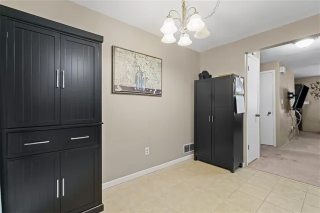 a view of a livingroom with a chandelier