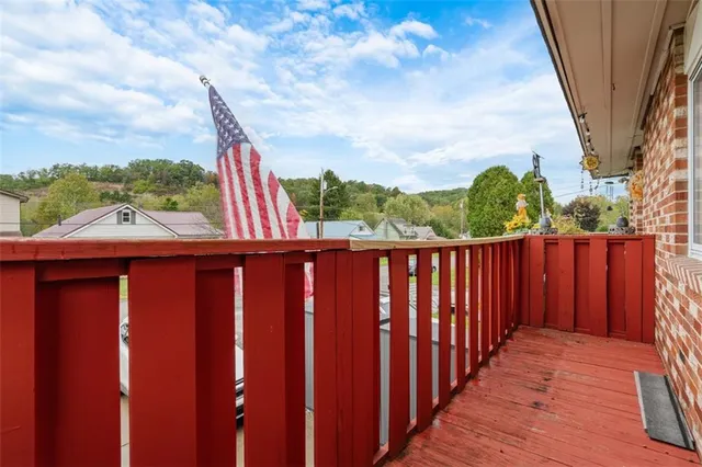 a balcony view with a garden