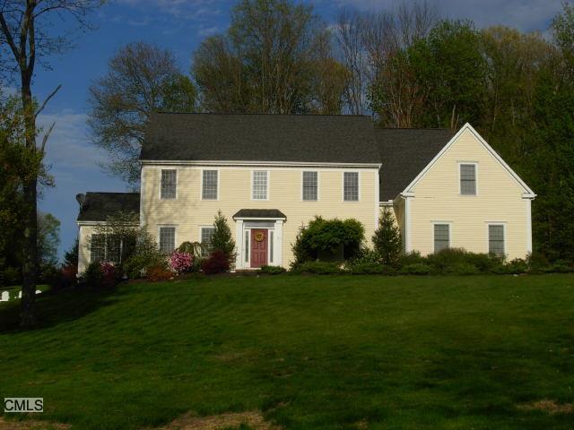 29 Mountain Manor Road Newtown, CT 06482 - Photo 1 of 1 a front view of a house with a garden
