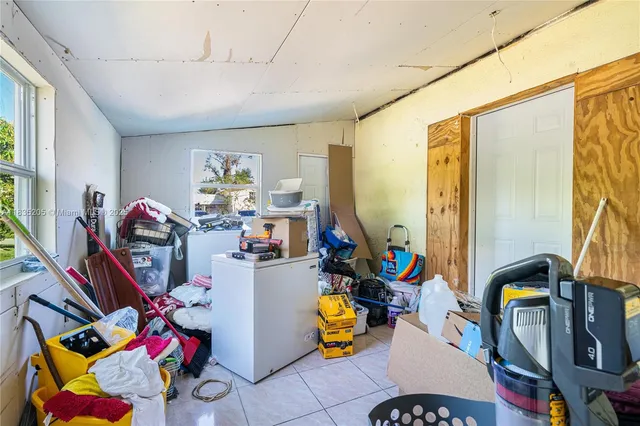 a view of living room with gym equipment
