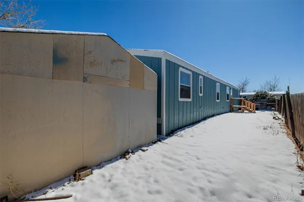 a view of a house with a snow
