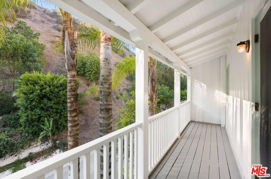 2120 Outpost Drive Los Angeles, CA 90068 - Photo 14 of 37 a view of a balcony with wooden floor