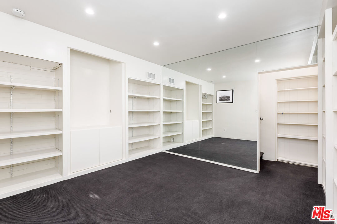 2120 Outpost Drive Los Angeles, CA 90068 - Photo 25 of 37 a view of an empty room with a closet
