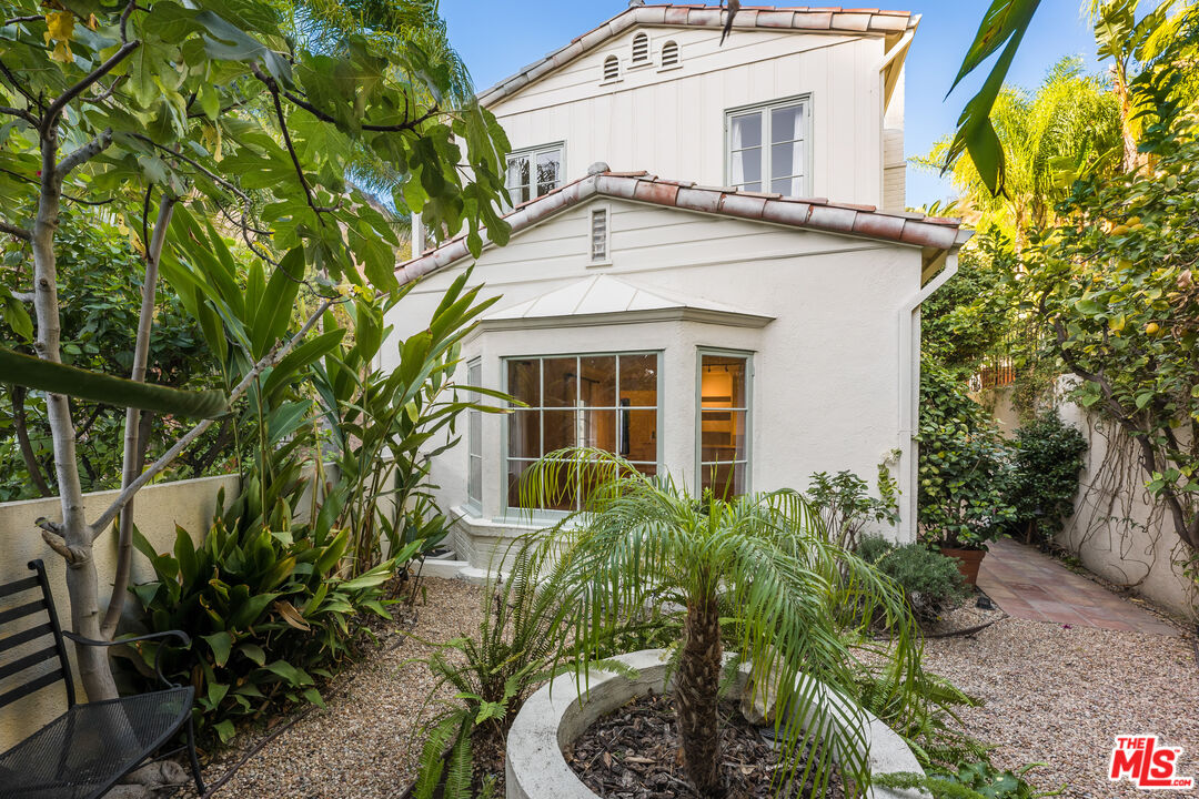 2120 Outpost Drive Los Angeles, CA 90068 - Photo 27 of 37 a front view of a house with garden