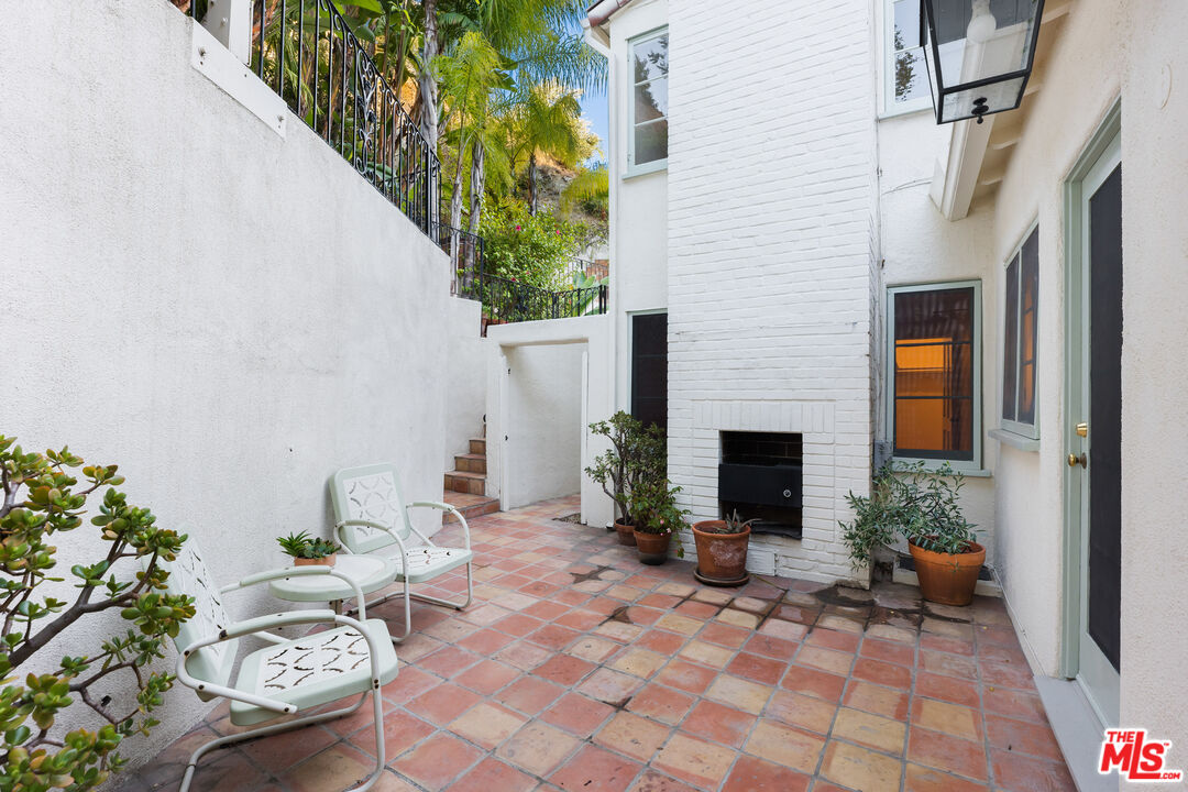 2120 Outpost Drive Los Angeles, CA 90068 - Photo 28 of 37 a backyard of a house with outdoor seating